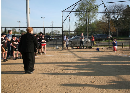 Leg Jacobs Throws Out the First Pitch for Syosset Girls Softball