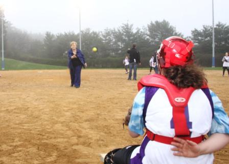 Legislator Judy Jacobs throwing the first pitch