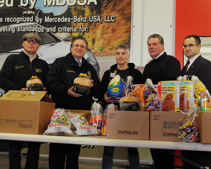 Mangano joins Mid Island Collision and LI Cares at Holdiday Meal donation