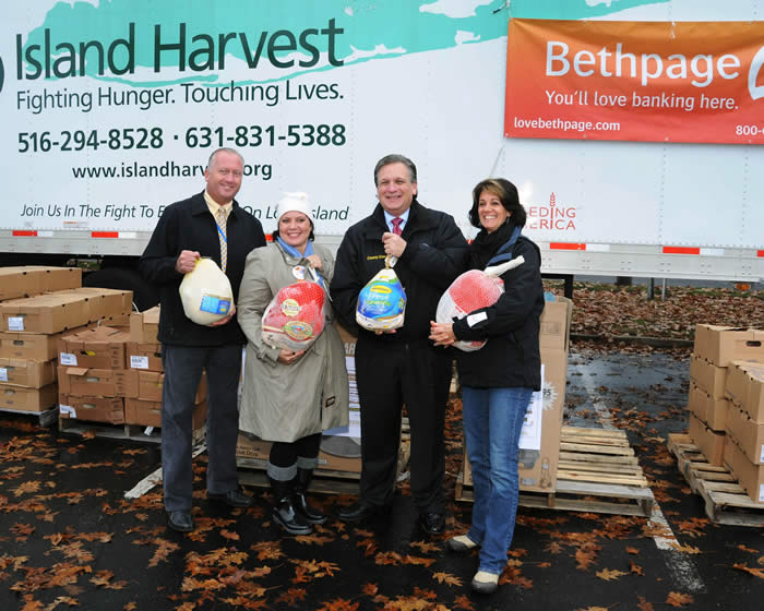 Mangano delivers donations to Island harvest food drive