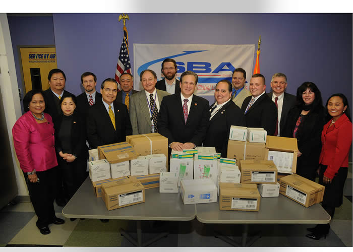 Mangano honors Woodbury business for getting critical medical supplies to typhoon survivors 