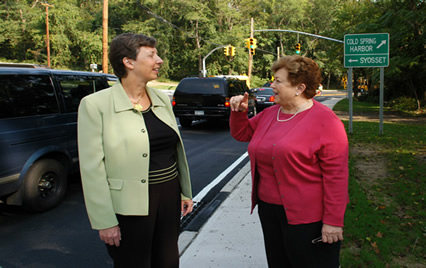 Presiding Officer Jacobs at new traffic light at Woodbury Road. 