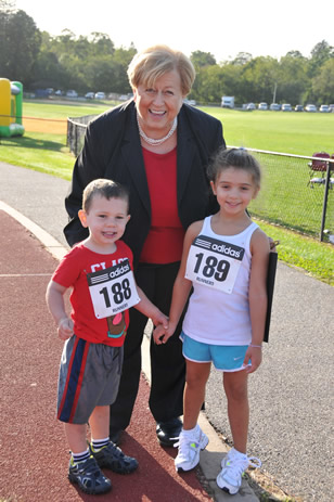 Legislator Jacobs with two of the young runners